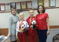 Гимнастки Вяземской спортшколы триумфально вернулись из Пекина .